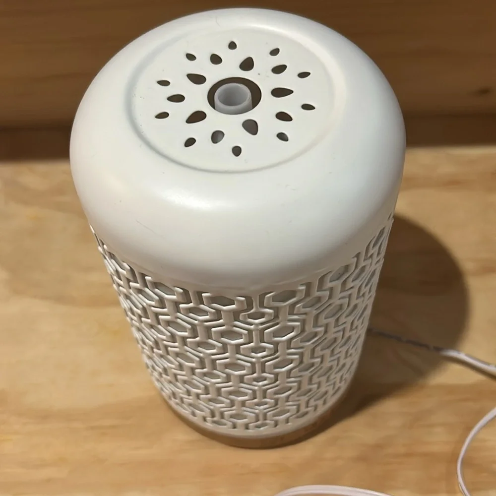 White Ceramic Aromatherapy Diffuser with a bottle of FOCUS essential oil